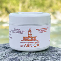 Unguento Eletta all'Arnica, barattolo su sfondo naturale